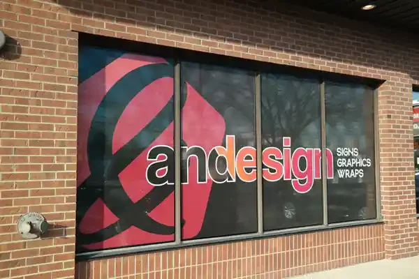 Window Graphics in storefront window of Andesign Signs and Graphics showroom