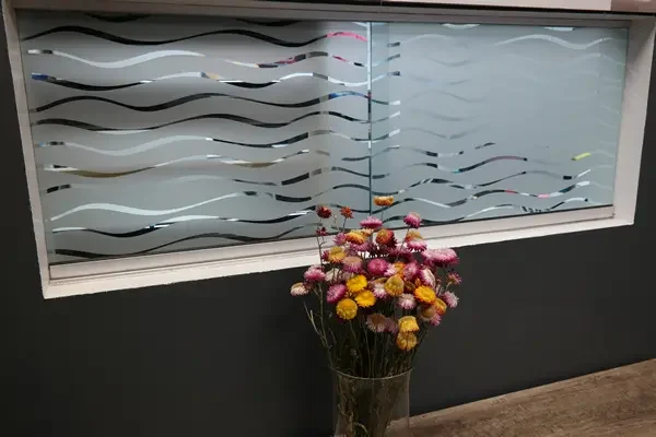 wavy frosted privacy applied to inner office window